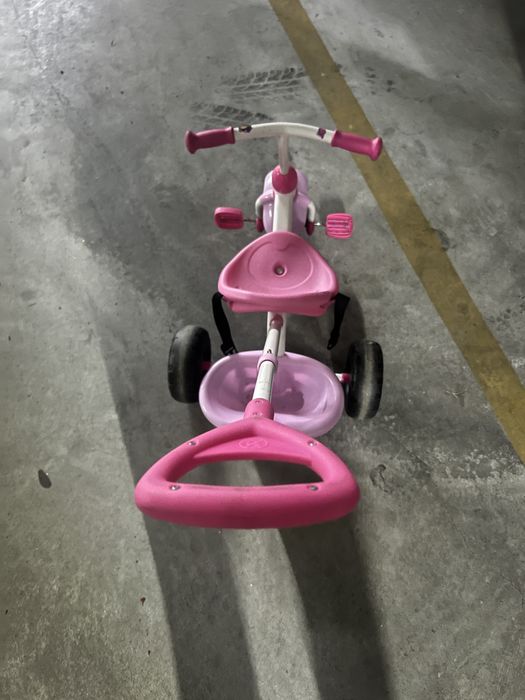 Triciclo rosa usado