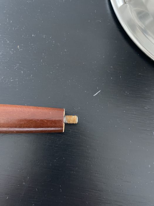 Fondue em aço inox e pega em madeira