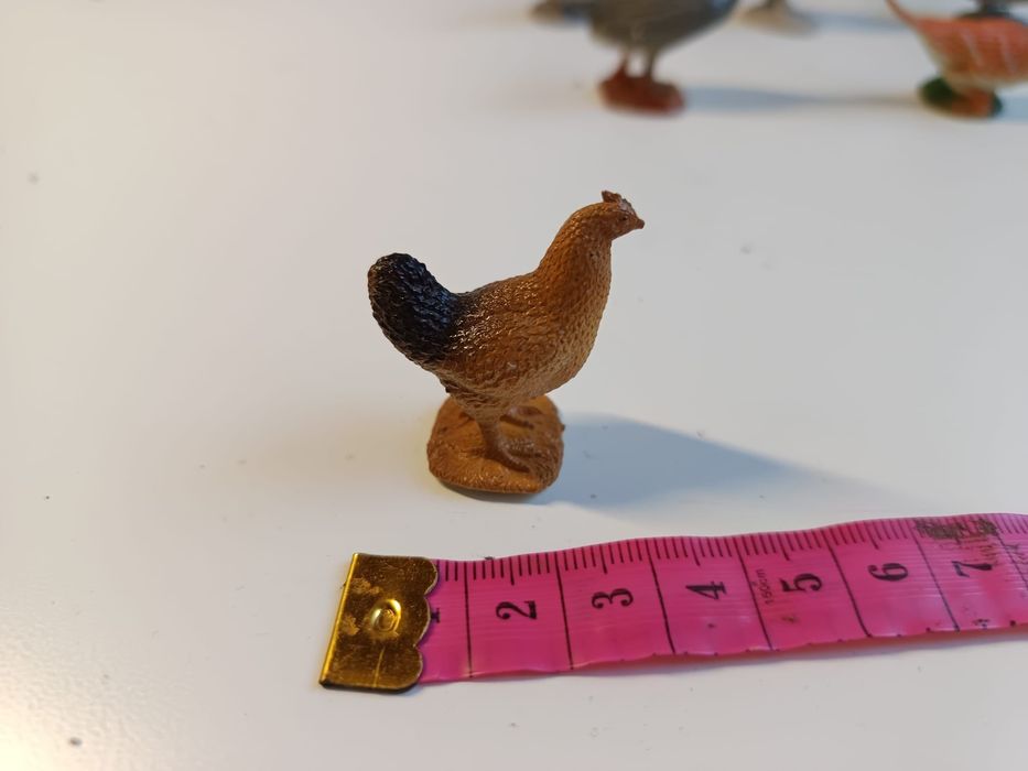15 bonecos em PVC aves