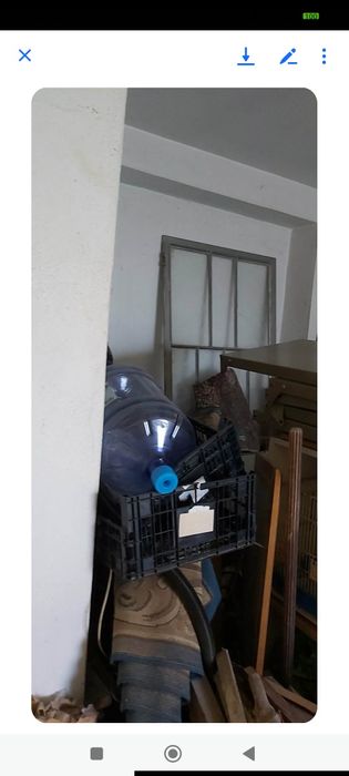 Porta de entrada em estrutura de ferro e vidro