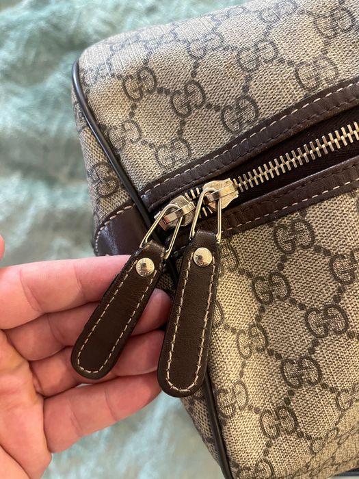 Gucci Travel Bag Monogrammed Coated Canvas
Beige