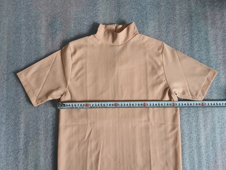 Блузка нова (44р.) виміри на фото!