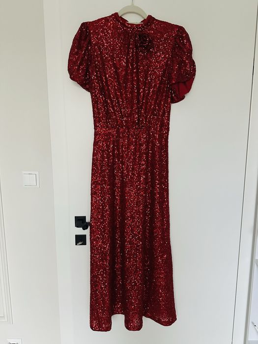 Cekinowa sukienka z bufistymi rękawami rozm. L