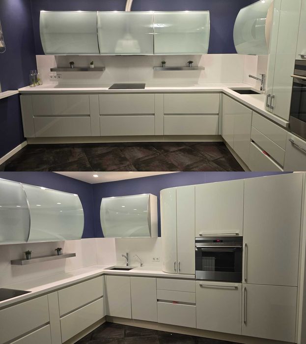 Біла кухня Г-подібної форми із вбудованою технікою