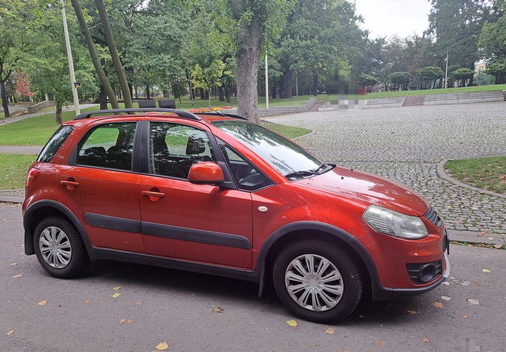 Suzuki SX4 1.6 Comfort benzyna garażowane - kolor miedziany