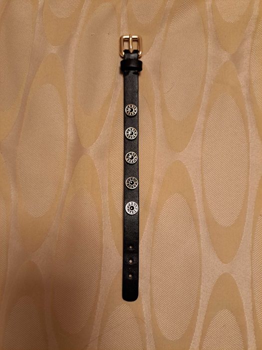 Pulseira Bimba y Lola preta e dourada