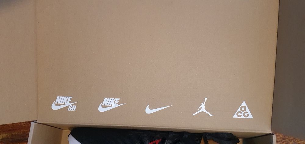 Nike down shifter grande novo