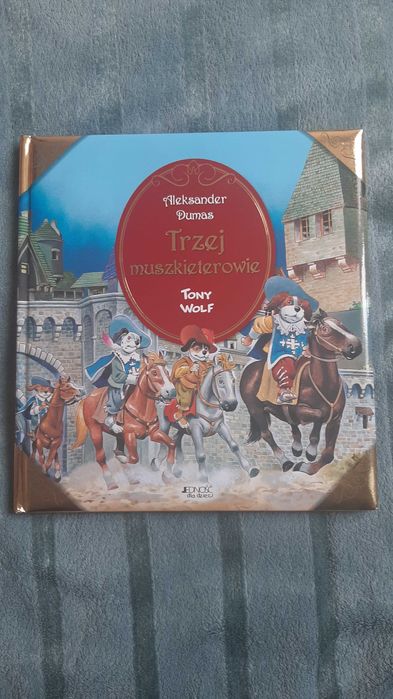 Trzej muszkieterowie piękne ilustracje Tony Wolf