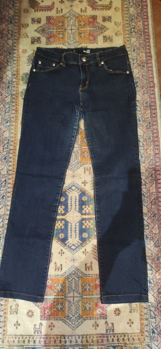 Calças moschino de mulher