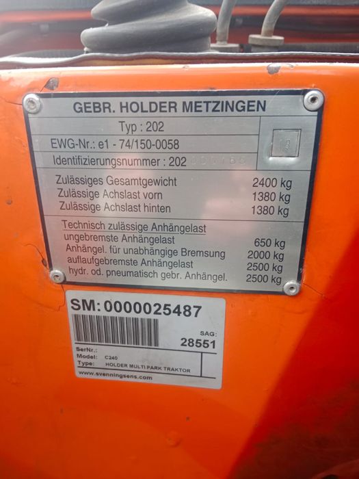 Holder ciagnik komunalny
