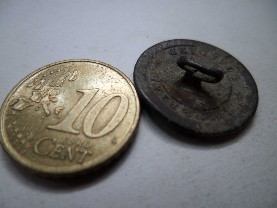 Botão antigo em Metal