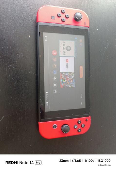 Nintendo Switch czerwone Joy-Cony + stacja dokująca