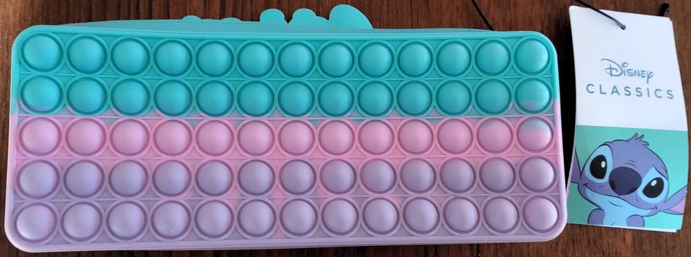 Bolsa Escolar Pop-it Stitch Silicone DIsney Leftie