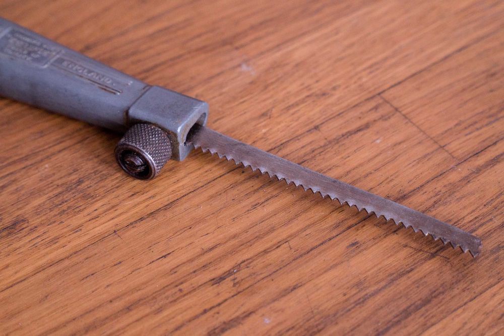 Zabytkowe narzędzia 1950: cyrkiel i mini piła Eclipse No 12