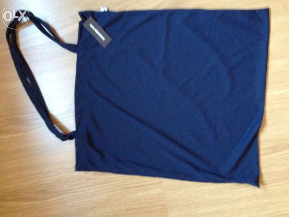 Sacos novos de praia com etiqueta.