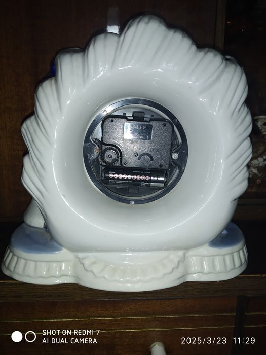 Статуэтка     Часы.