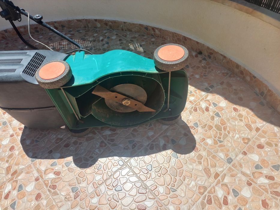 Maquina de cortar relva.
