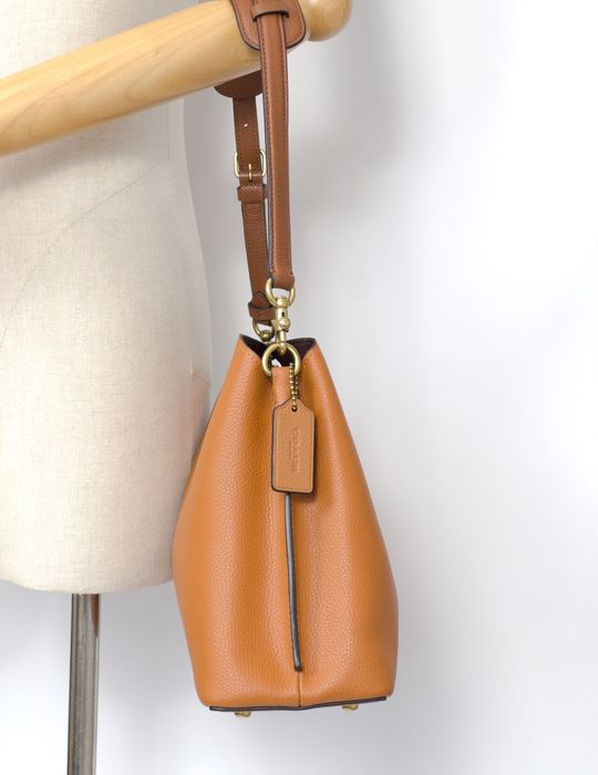 Прадам сумку Coach