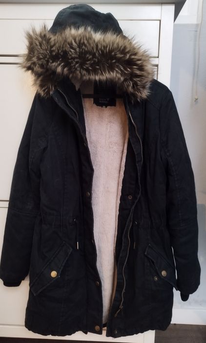 Quispo com carapuço e forrado