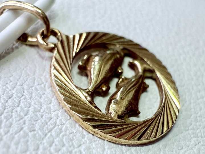 Zawieszka złota 585 Ryby | waga 0,74 g | średnica 11mm | UŻYWANA |