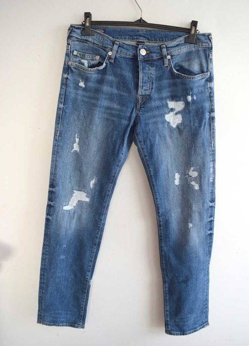True Religion
Jeansy Zwężane przecierane w32 m męskie