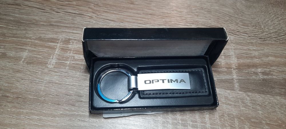 Продам брелок на ключи KIA UQ016AY744
