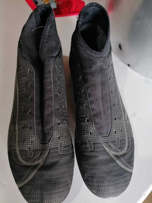 Chuteiras como novas.