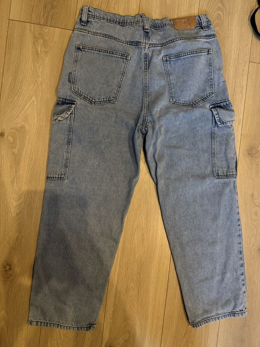 Spodnie jeansowe niebieskie  loose 34/32 cropp