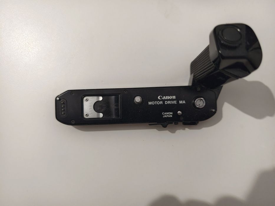 Canon A-1 + Canon FD 50mm 1.4 + Canon Motor Driver MA + canon Baterry pack MA