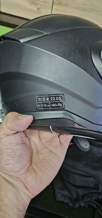 Capacete e luvas e botas de Moto
