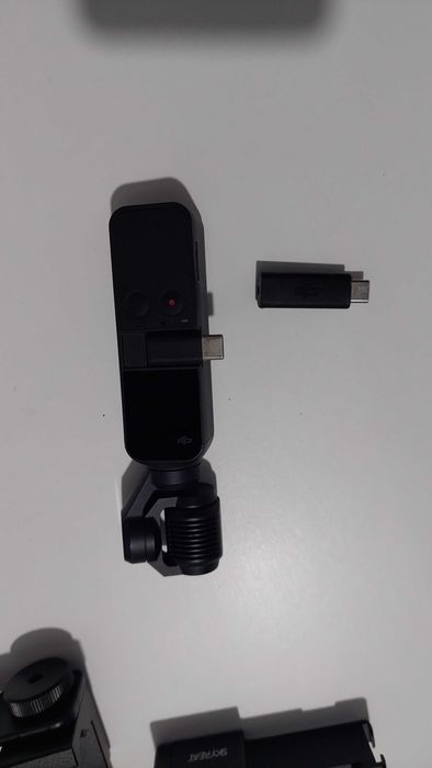 DJI osmo pocket (lente partida) c/ cx estanque e mts acessórios