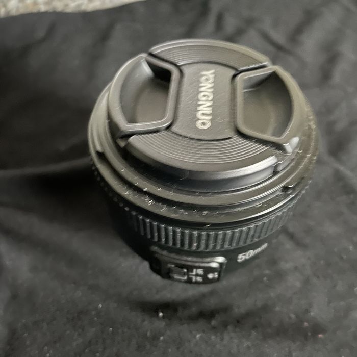 Nikon d5100 usada lente nikon 18-55 e lente yongnuo 50mm