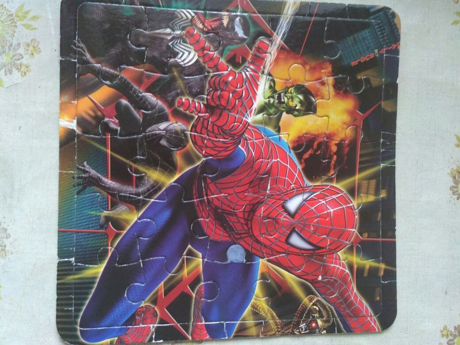 Паззлы в рамке из разных мультиков