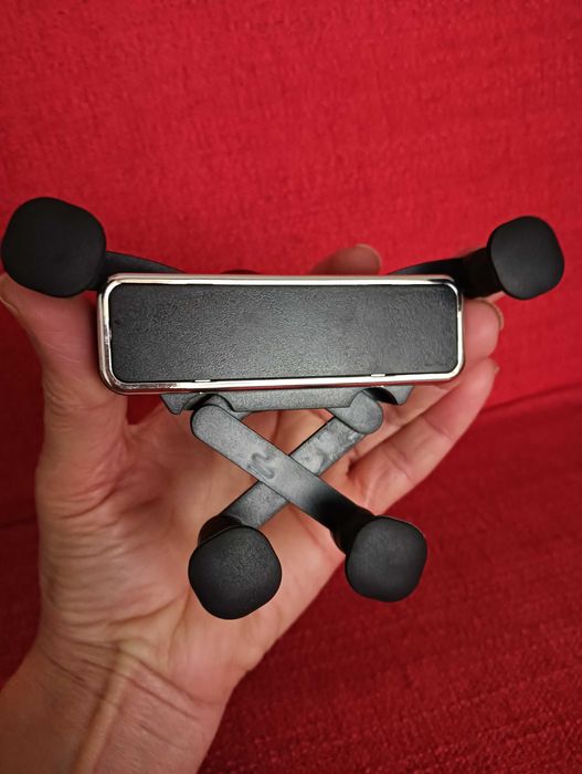 Suporte manual ajustável de telemóvel para viatura