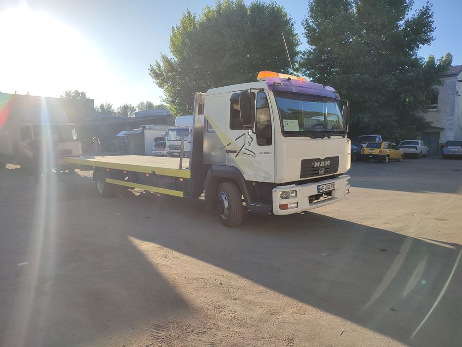 Эвакуатор в Днепре, легковой, грузовой.платформа до 7т,  по Украине