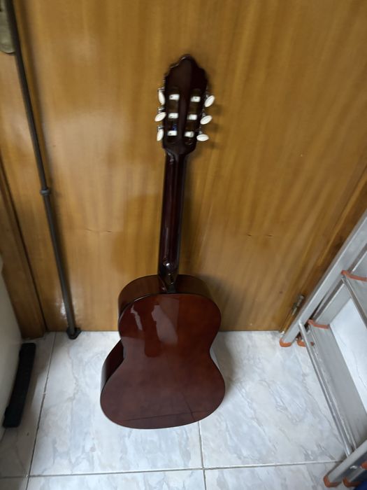 Viola como nova com mochila