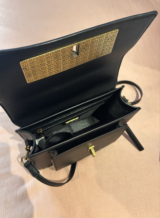 Bolsa versage Jeans Couture como nova