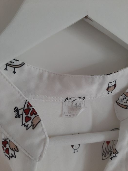 Biała koszula, elegancka bluzka damska w sowy z kieszeniami Terkol