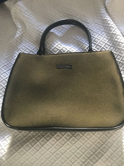 Mala nova de verniz verde água e outras malas