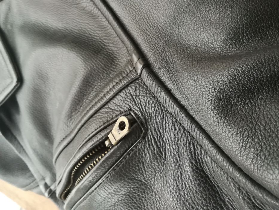 Casaco em pele.. Muito bom