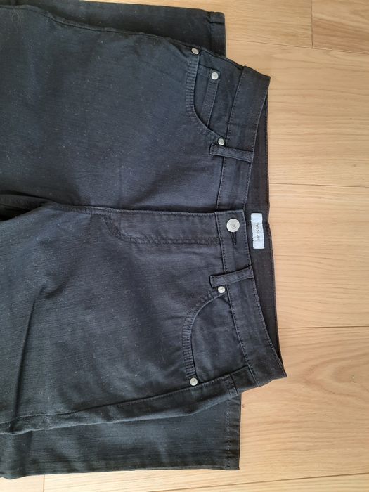 Czarne bawełniane spodnie typu jeansy bootcut