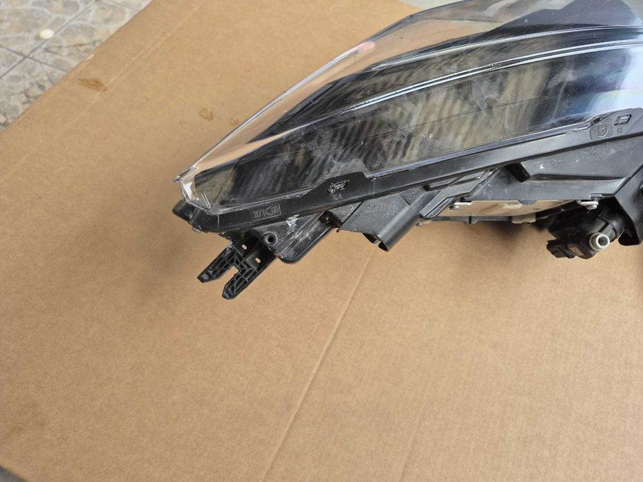 Farol esquerdo Renault Zoe