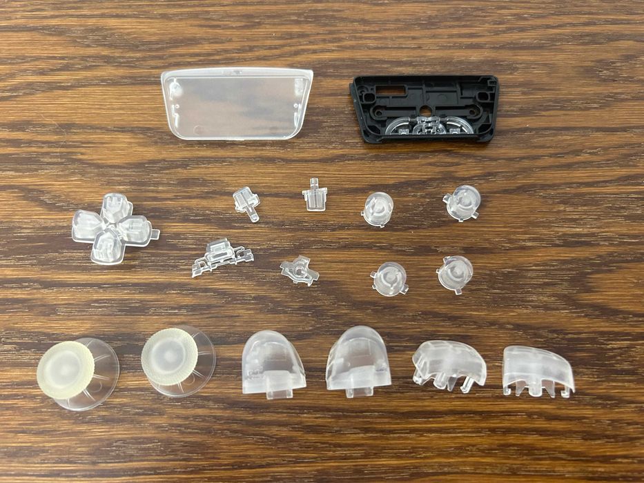 PS5 playstation 5 dualsense pad  bezbarwne przyciski transparent