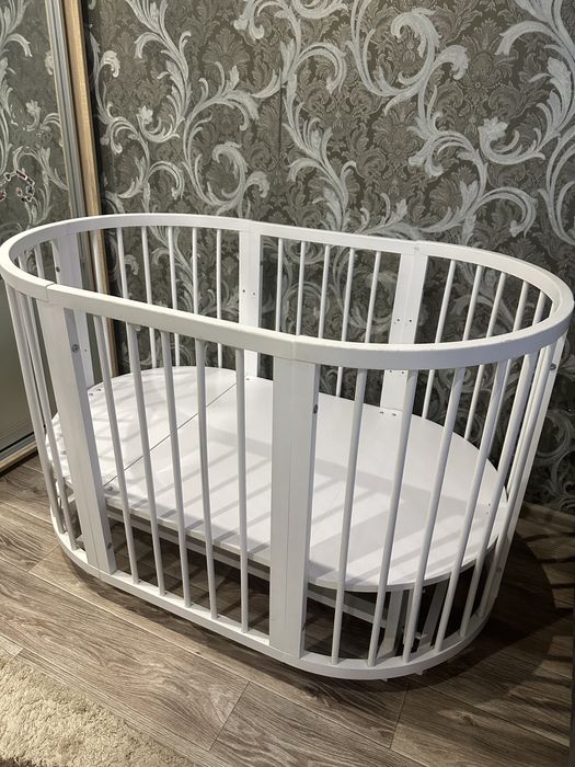 Дитяче ліжечко з маятником 2 в 1