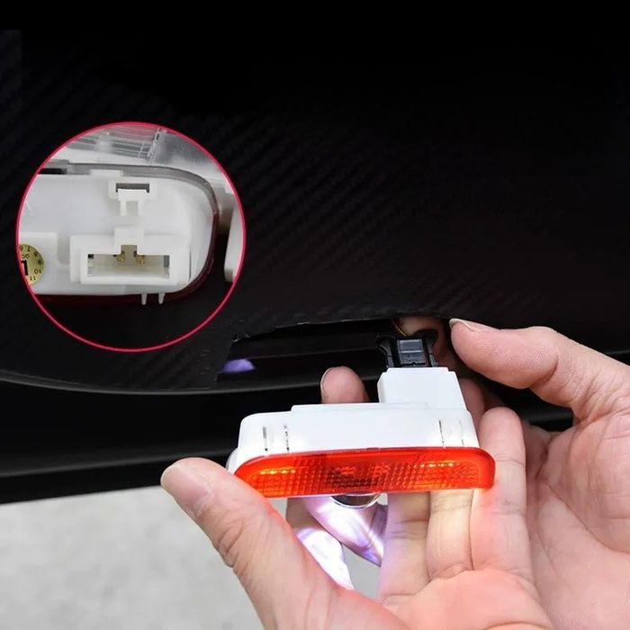 Luz de cortesia logótipo vw