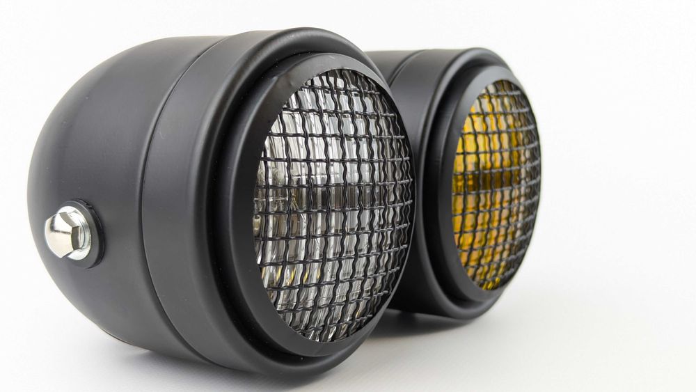 Подвійна металева мото фара з галогенками H4 та габаритом