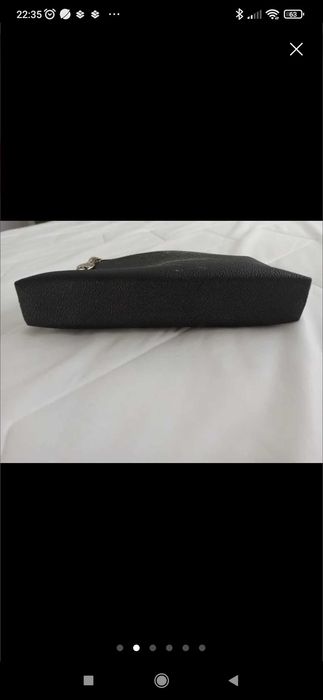 Mala tiracolo em pele