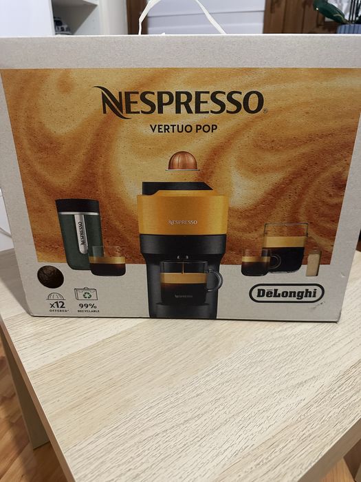 Ekspres kapsułkowy czarny nespresso vertuo kawa w kapsulkach