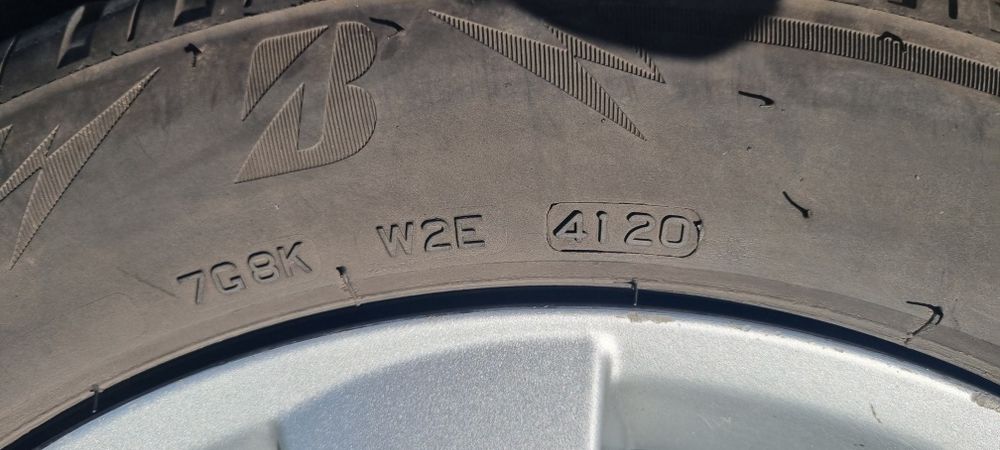 Felgi aluminiowe Mazda + 4 opony zimowe Bridgestone