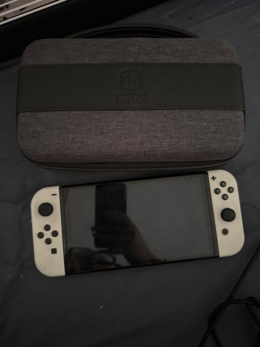 Nintendo Switch OLED biały + gry + joycony+karta 128 GB+dock